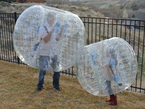 People Playing in Bubble Balls